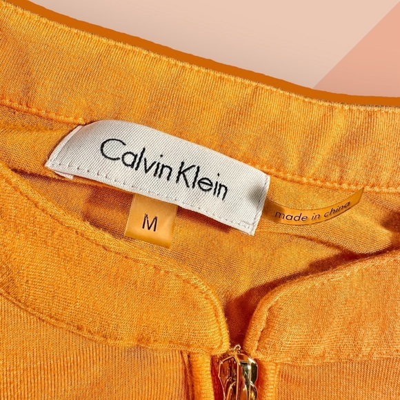 Calvin Klein Bright Orange Roll-Tab Sleeve 1/2 Zip Pocketed Top Size Medium - Picture 2 of 10